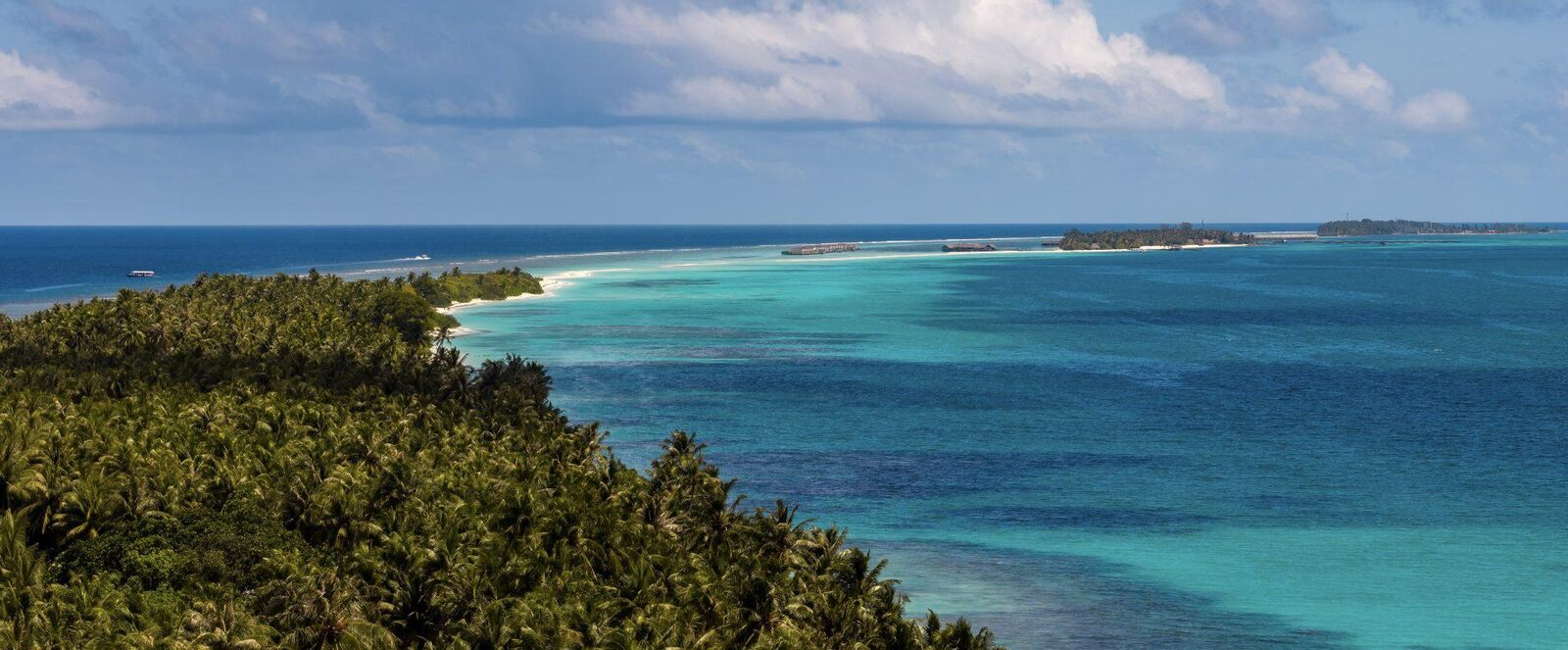 Aerial panorama of Dhigurah island and its surrounding reef